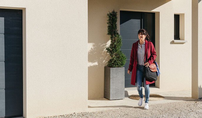 woman leaving her home peacefully 